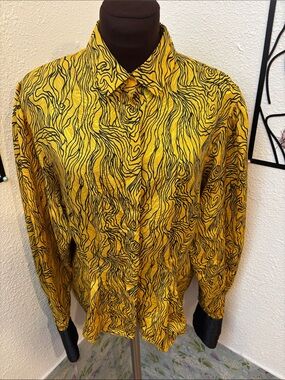 Vintage 1980’s Nilani gold and black long sleeve button-up blouse. Size 11/12